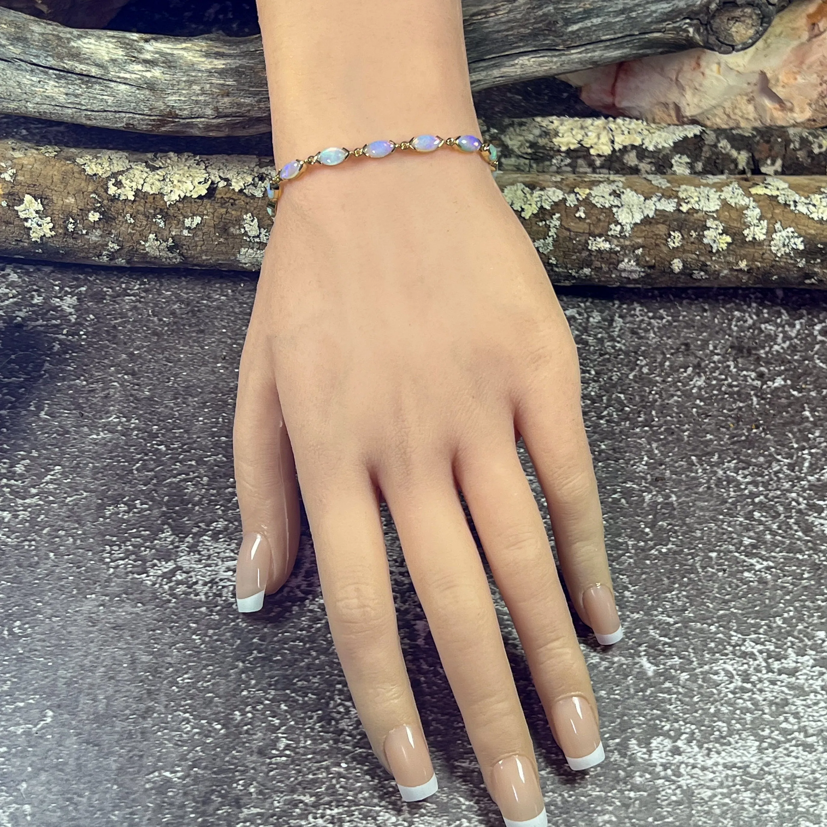 9kt Yellow Gold Marquise shape V claw Light Opal bracelet 21.5cm