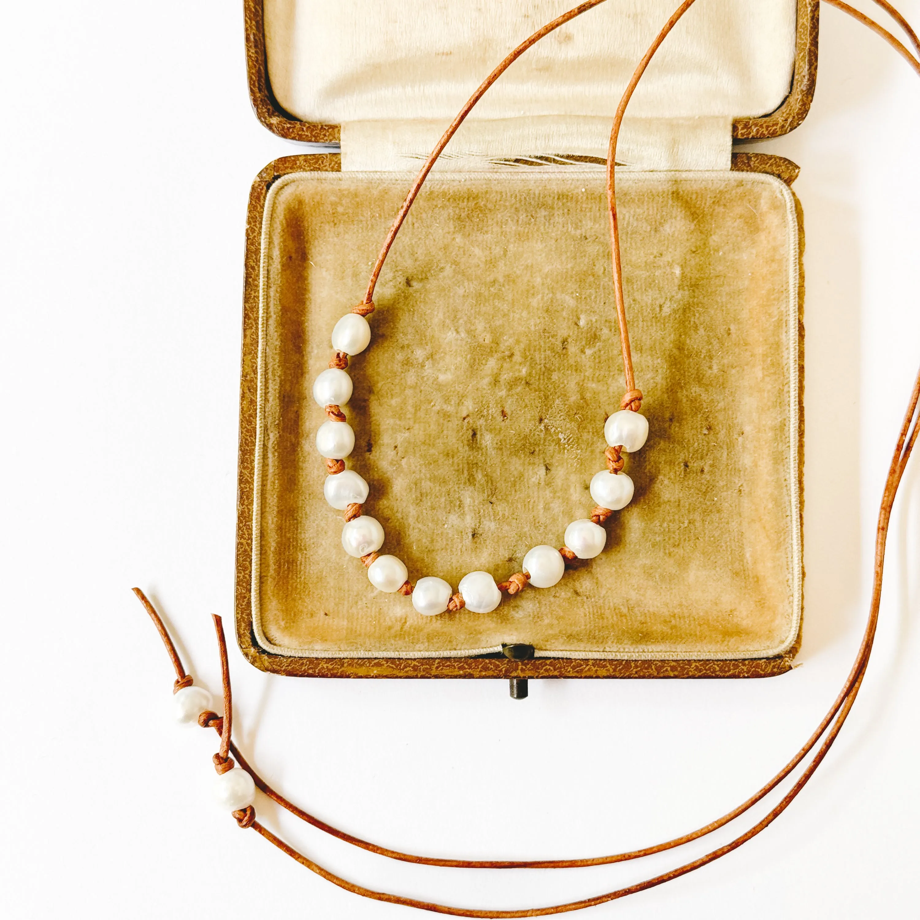 Adjustable Pearl and Leather Cord Necklace