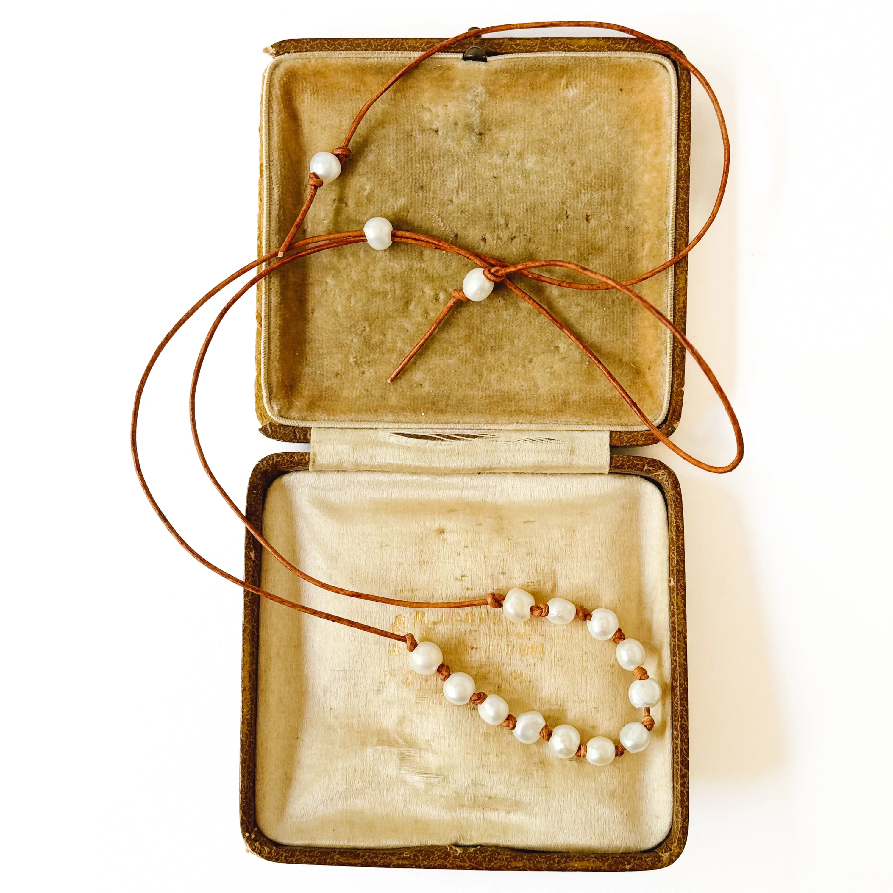 Adjustable Pearl and Leather Cord Necklace
