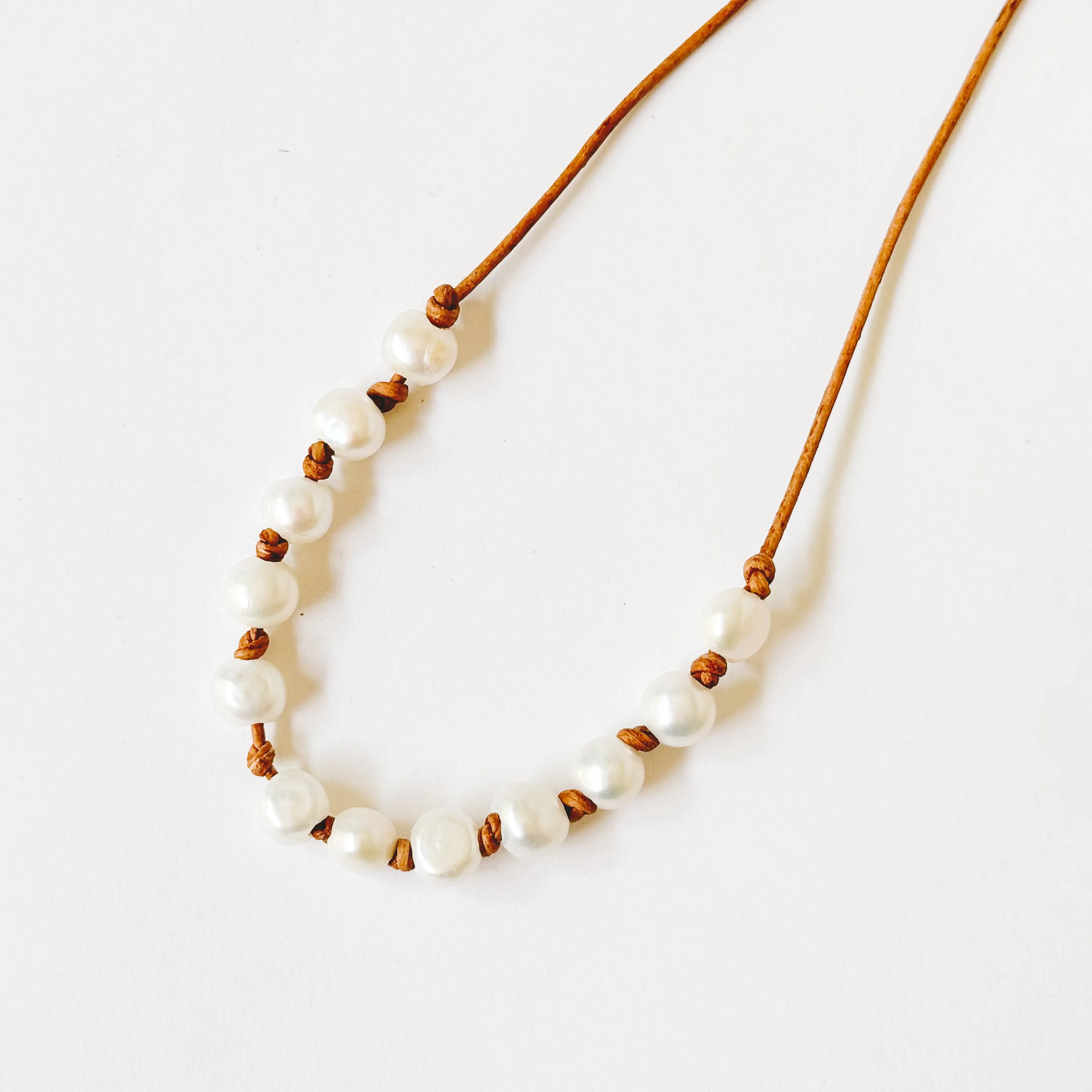 Adjustable Pearl and Leather Cord Necklace