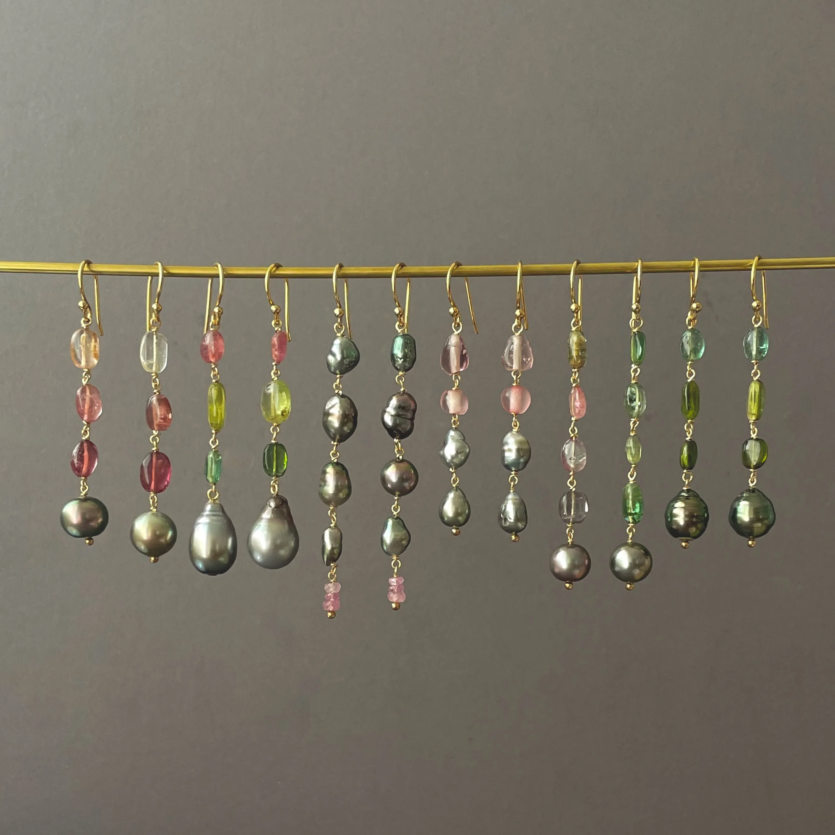 Fancy color Tahitian keshi pearl and African glass earrings