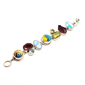 Original and special silver bracelet with enamel and different natural stones.